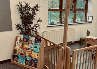 wooden book shelf by a window Eden Nursery